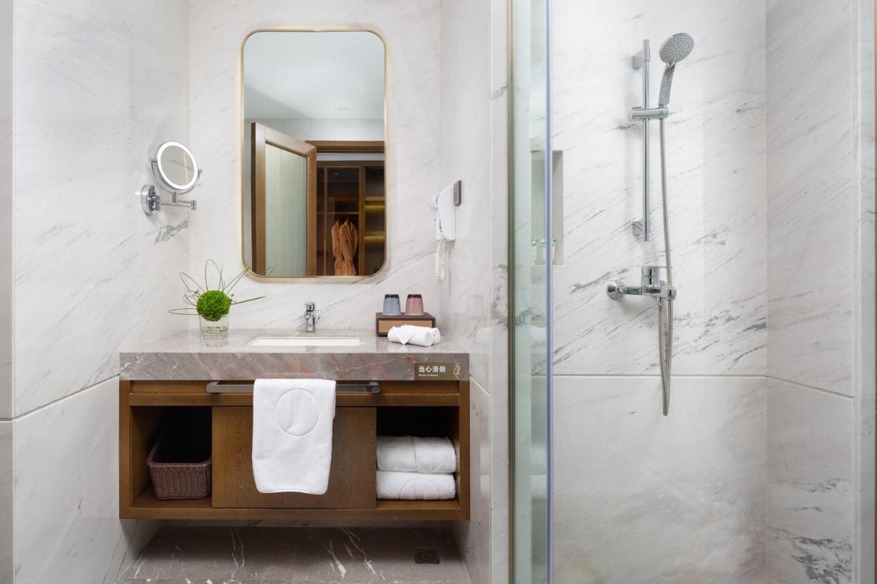 Luzhou Jianguo Hotel Bagian luar foto