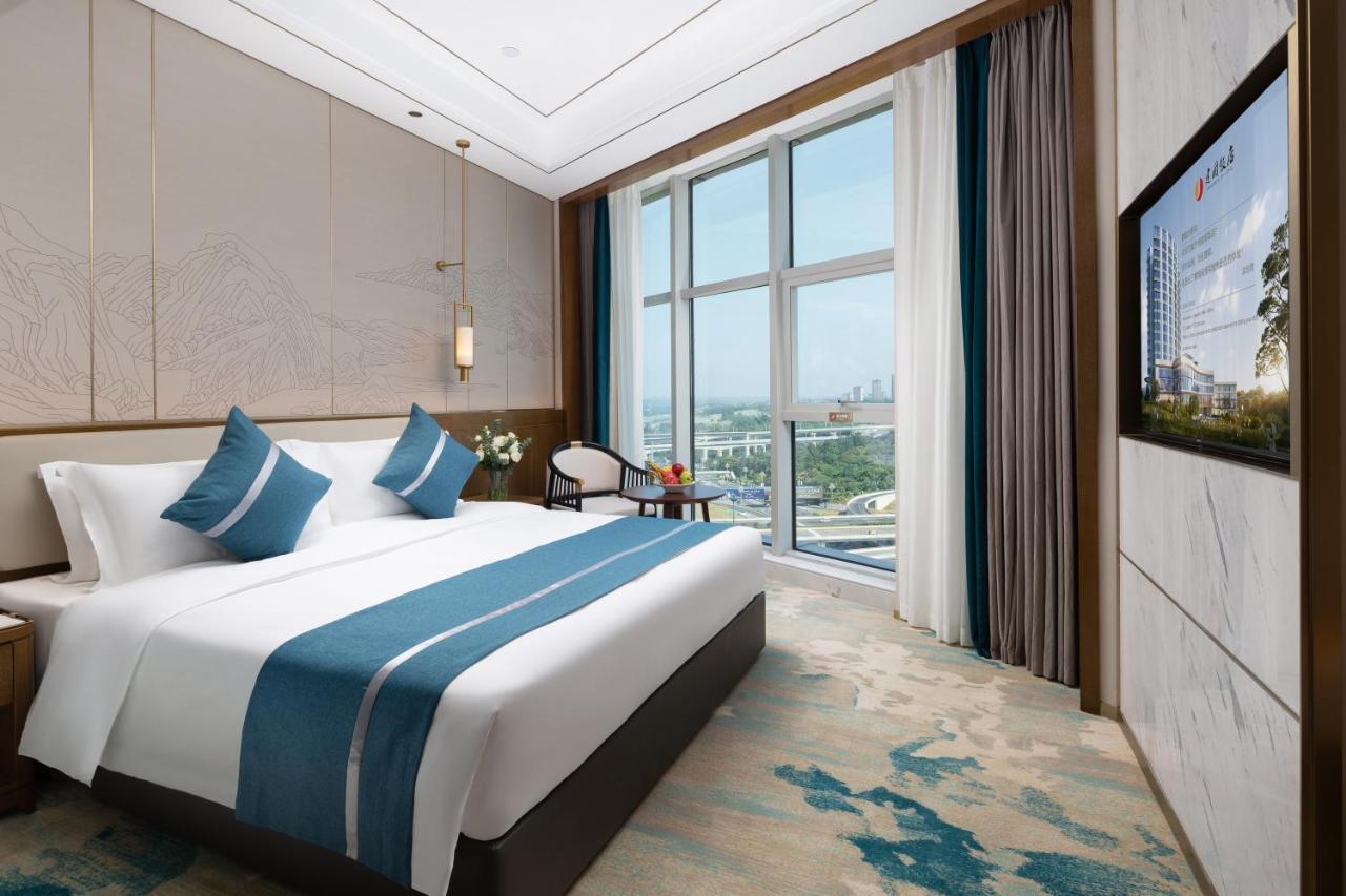 Luzhou Jianguo Hotel Bagian luar foto