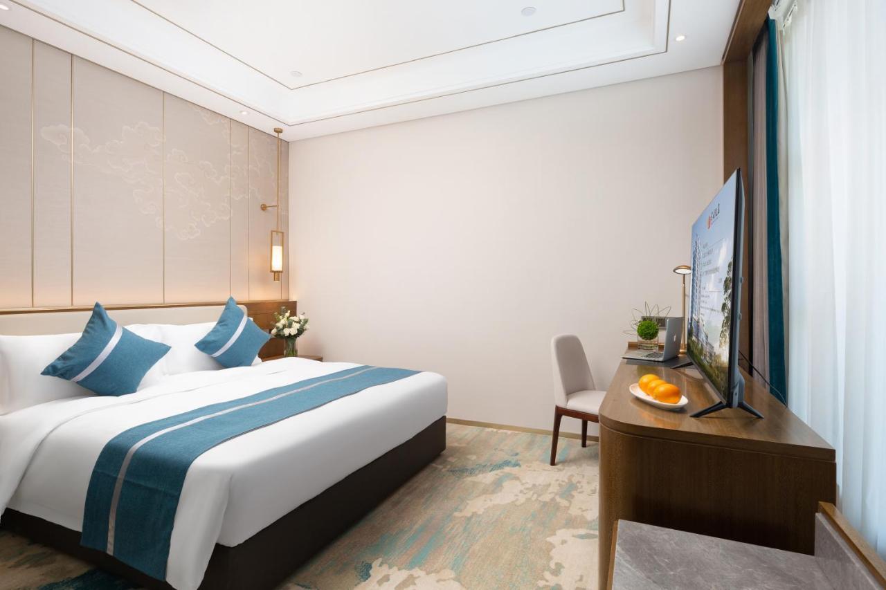 Luzhou Jianguo Hotel Bagian luar foto