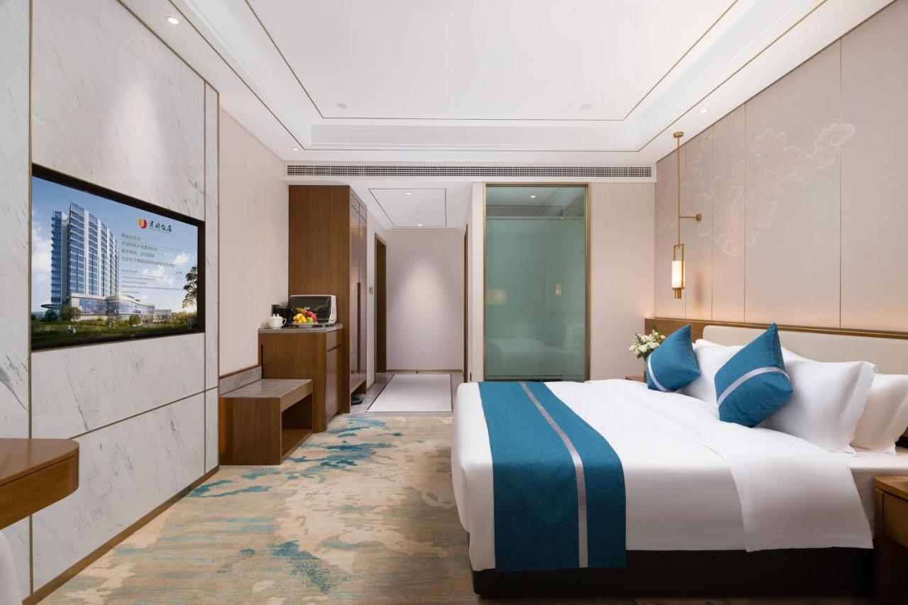 Luzhou Jianguo Hotel Bagian luar foto