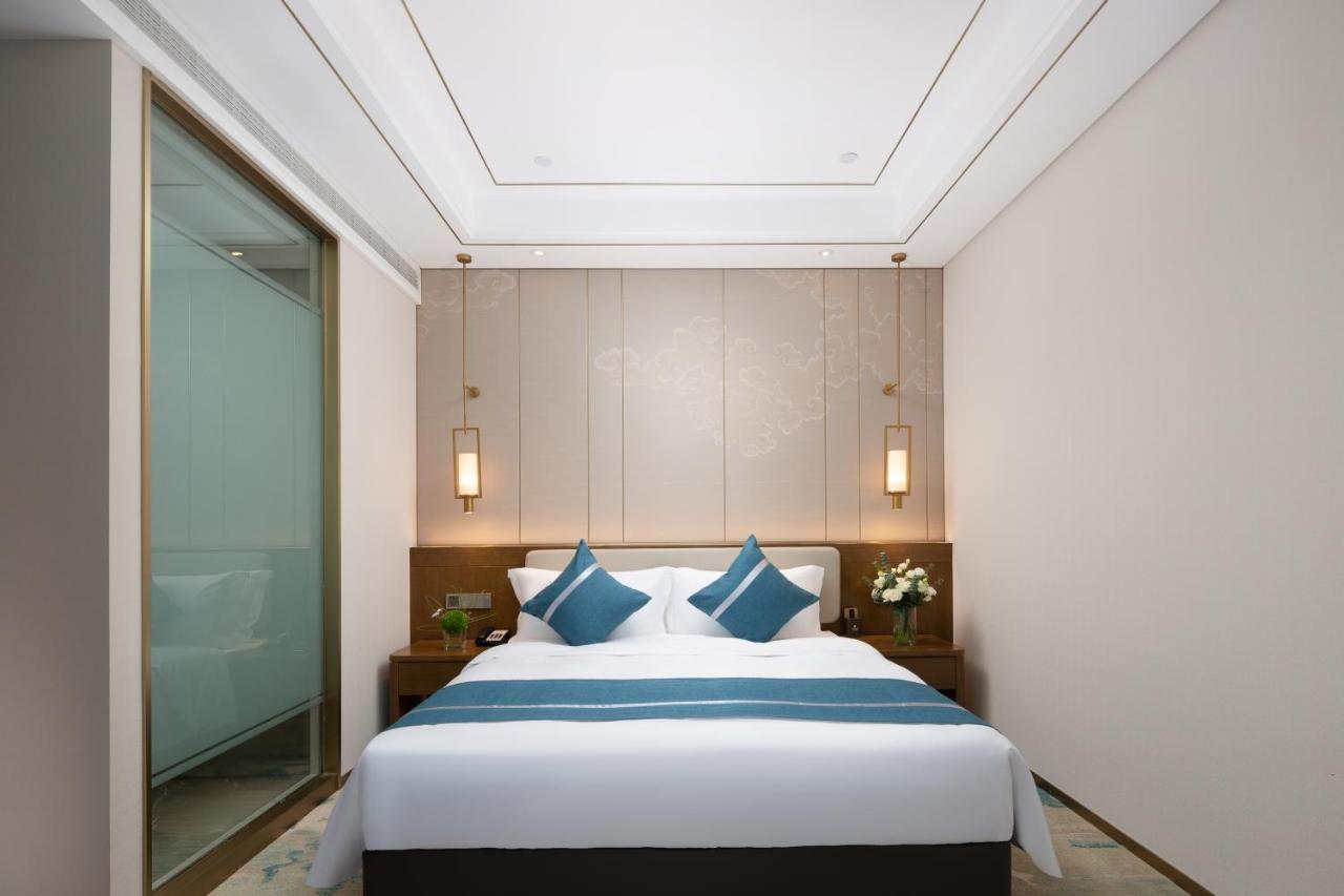 Luzhou Jianguo Hotel Bagian luar foto