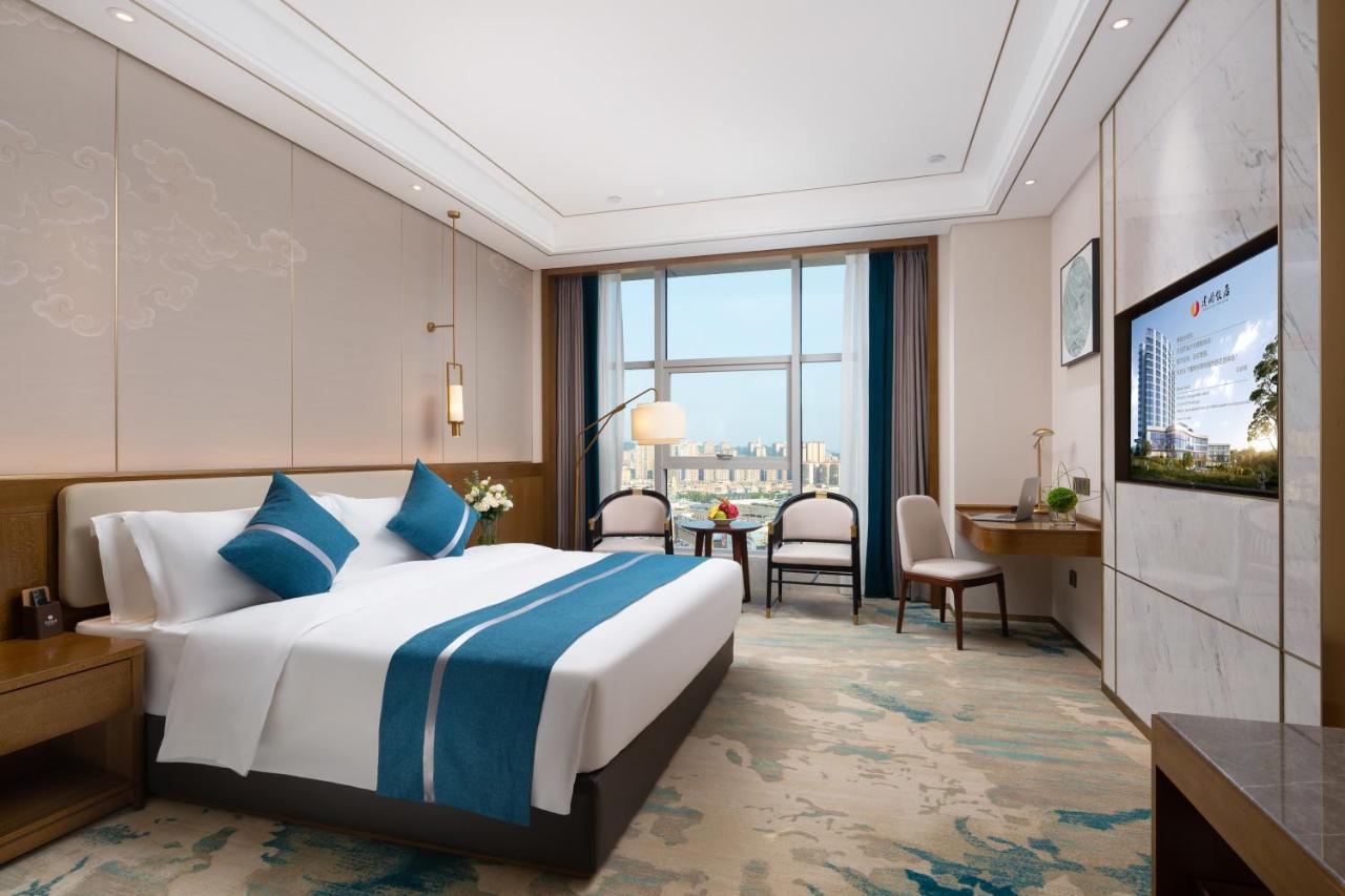 Luzhou Jianguo Hotel Bagian luar foto